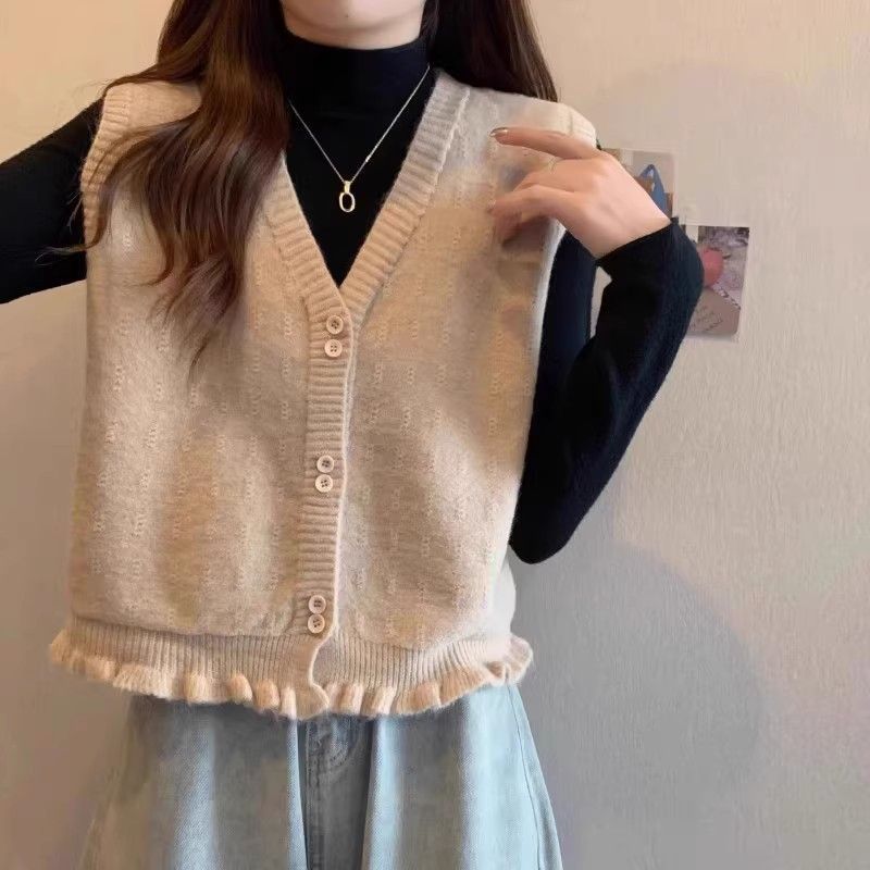Gilet en tricot pour femme avec ourlet à volants ludiques Chic & Stil