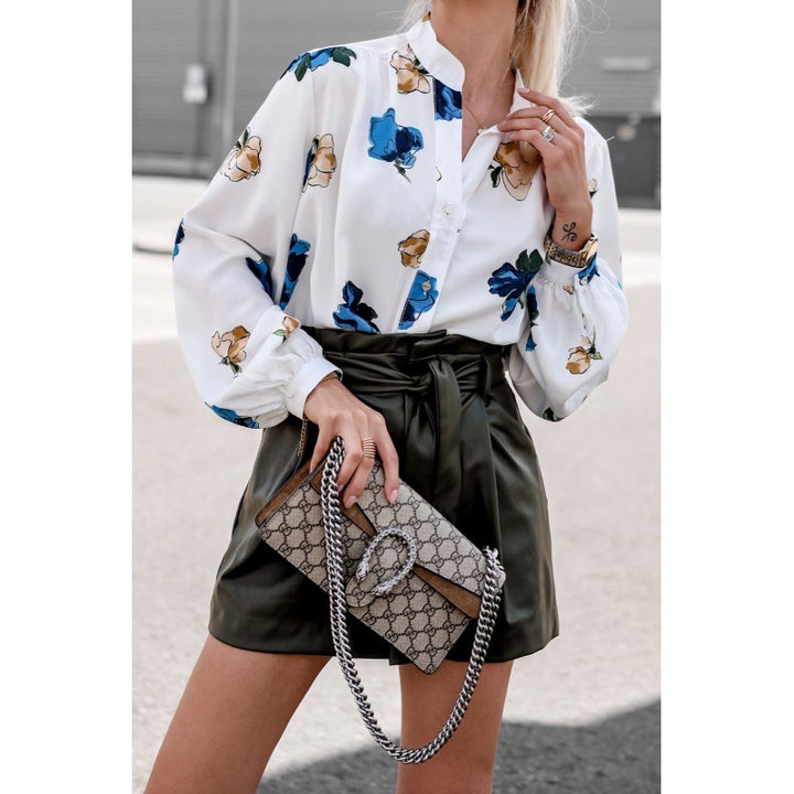 Blouse pour femmes avec motif floral et manches ballon Chic & Stil