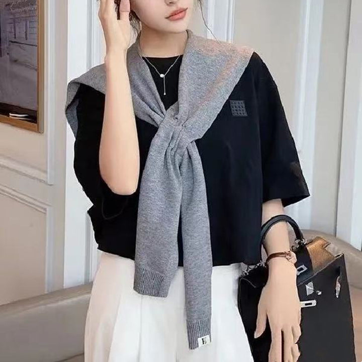 Trendy knitted scarf for women with bow detail Lune London