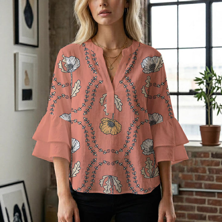 Women's blouse with voluminous ruffle sleeves and creative floral design Lune London