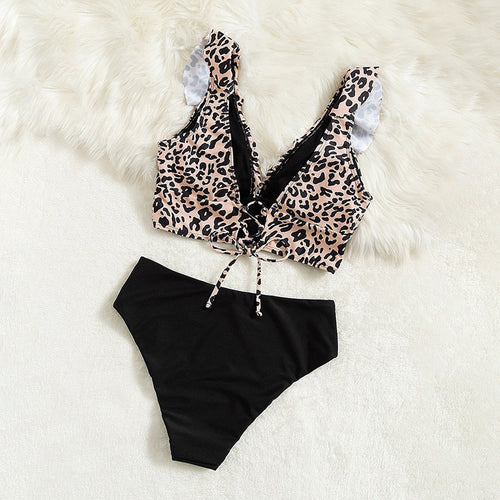 Ladies ruffled top with chic leopard print and style