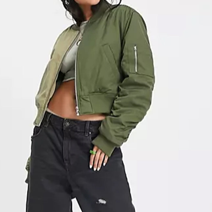 Trendy women's bomber jacket with a playful patchwork design and practical zip pockets Lune London