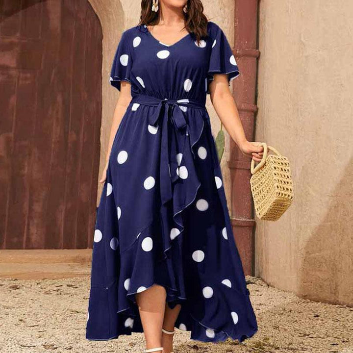 Maxi dress for women with a playful polka dot pattern and a fitted belt Lune London