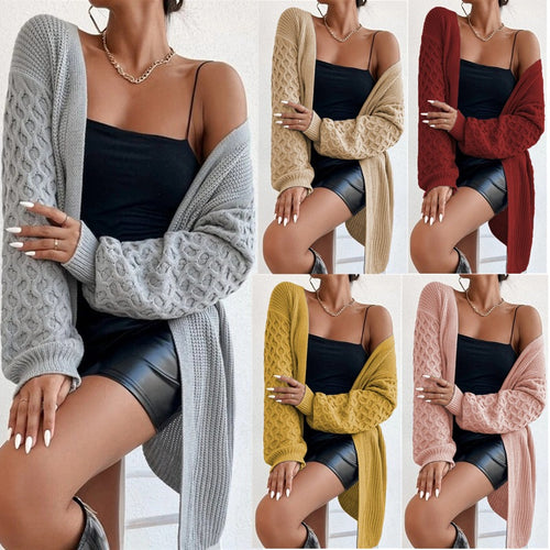 Knitted cardigan for women with an asymmetrical design and deep pockets Lune London