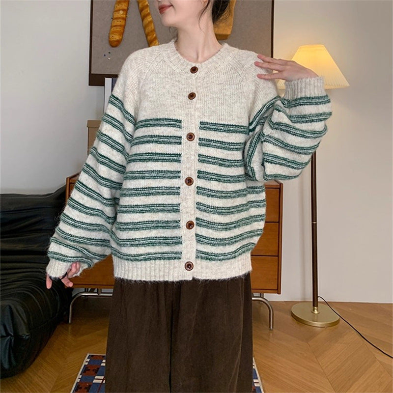 Ladies Chunky Knit Jacket with Modern Stripes and Chic Button Details and Style