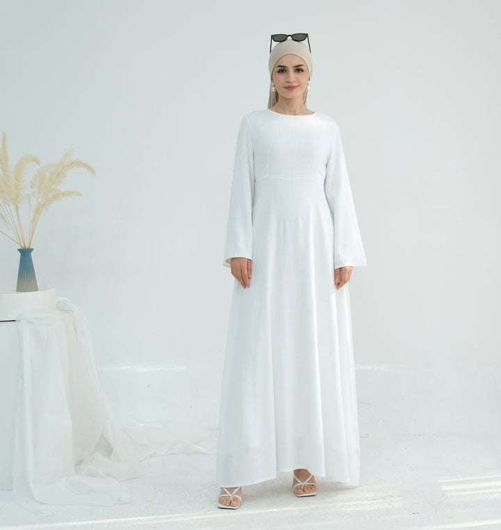 Elegant maxi dress for women with long sleeves and side pockets Lune London