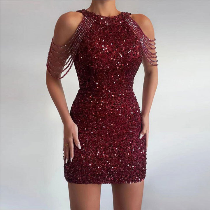 Women's mini dress with shiny sequin embellishment and elegant chain sleeves Lune London