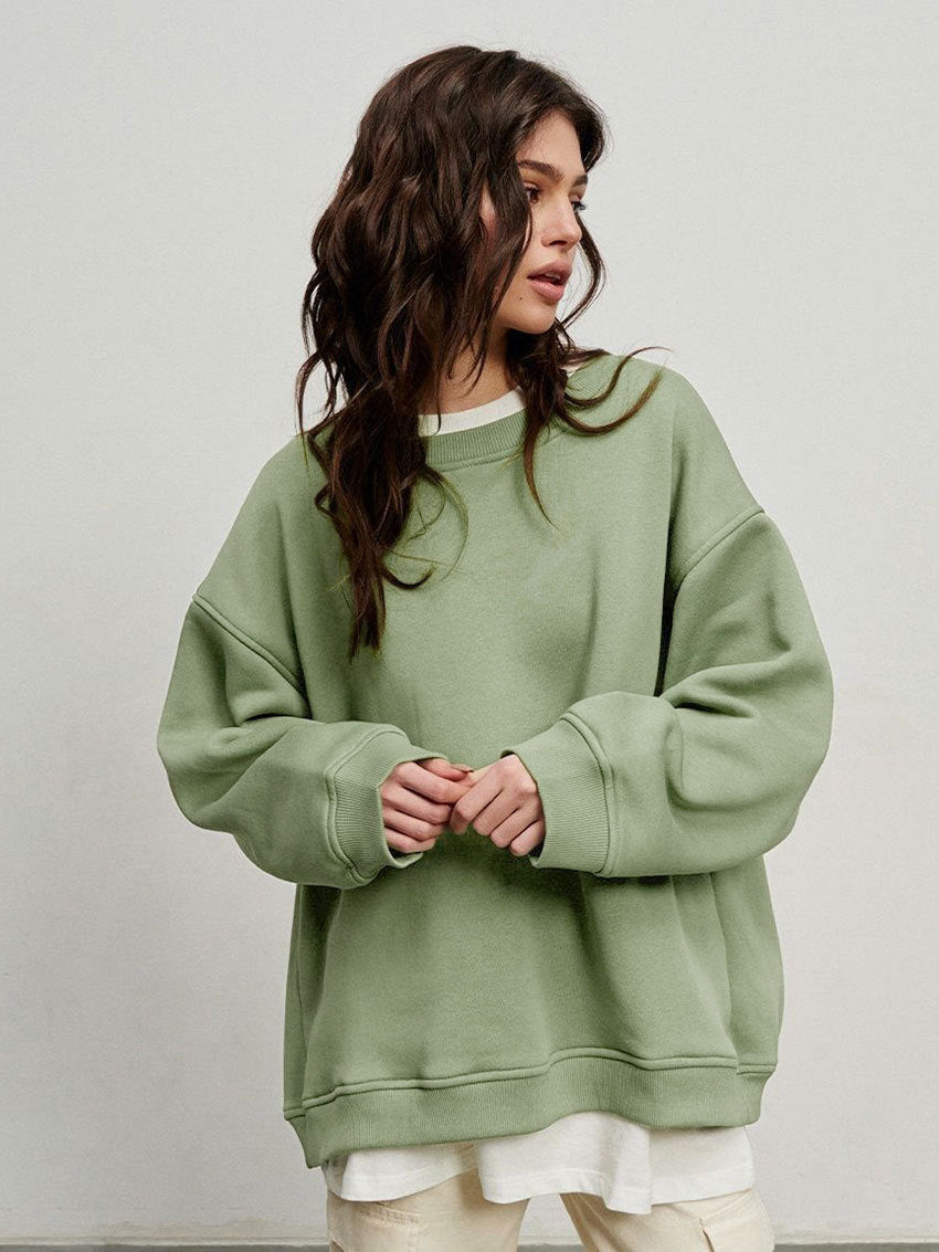 Woman Oversized sweatshirt with a relaxed fit and modern chic accents and style