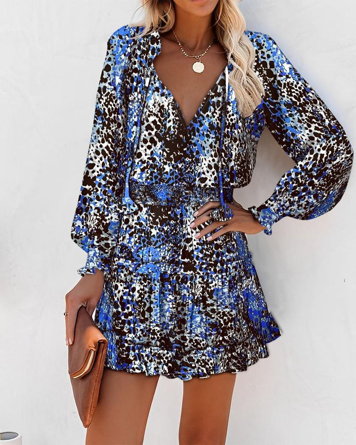 Ladies mini playful dress with colorful pattern and flounced details Lune London