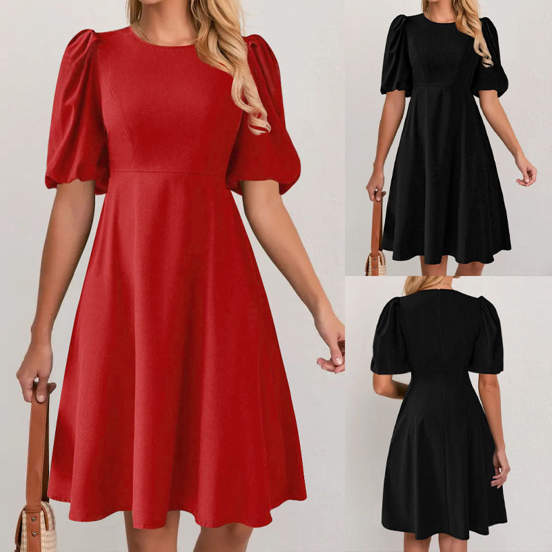 Puff sleeve dress for women with a flowing cut and waist accentuation Lune London