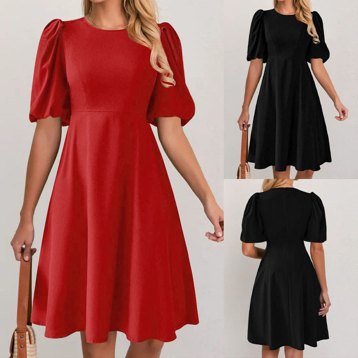 Puff sleeve dress for women with a flowing cut and waist accentuation Lune London