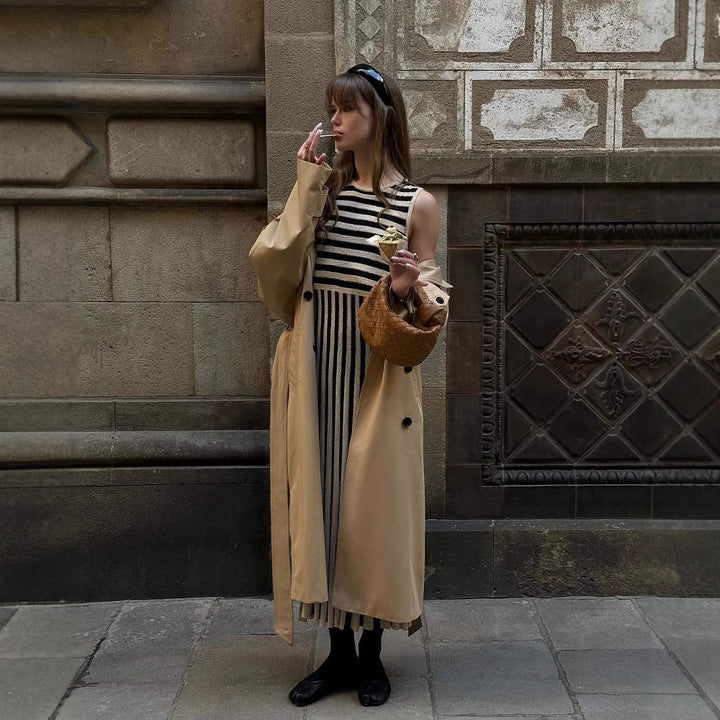 Maxi dress for women with an asymmetrical stripe pattern and elegant ruffle trim Lune London