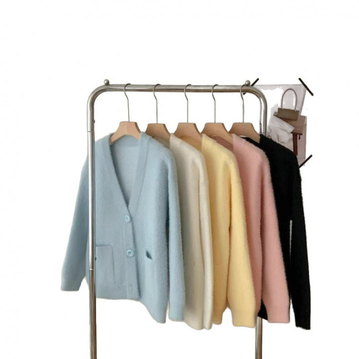 Cardigan pelucheux à boutons pour femmes avec poches élégantes Chic & Stil