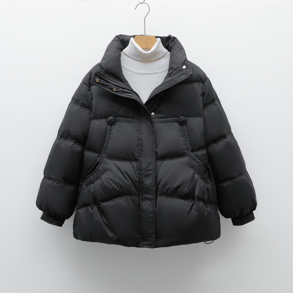 Bulky winter jacket for women with practical pockets and high collar Lune London