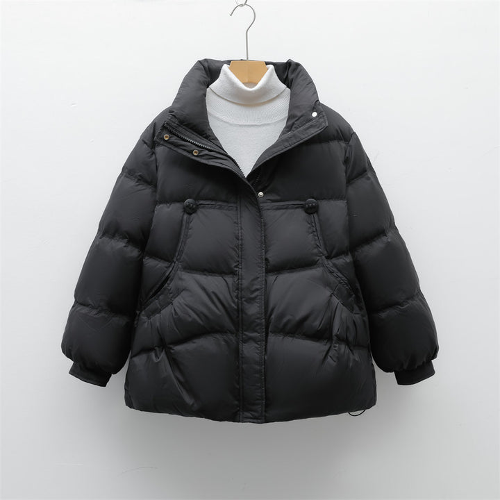 Bulky winter jacket for women with practical pockets and high collar Lune London