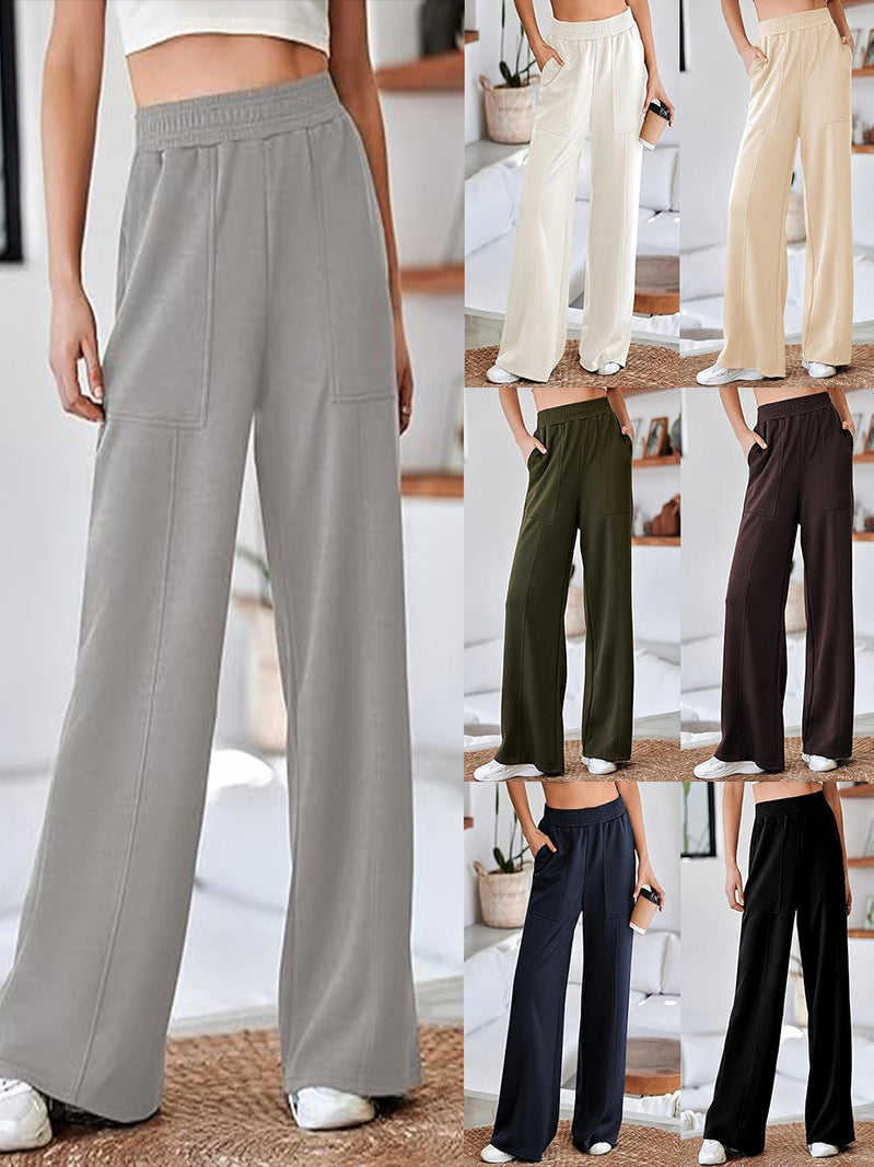 Loose sports pants for women with elastic waistband and practical side pockets Lune London