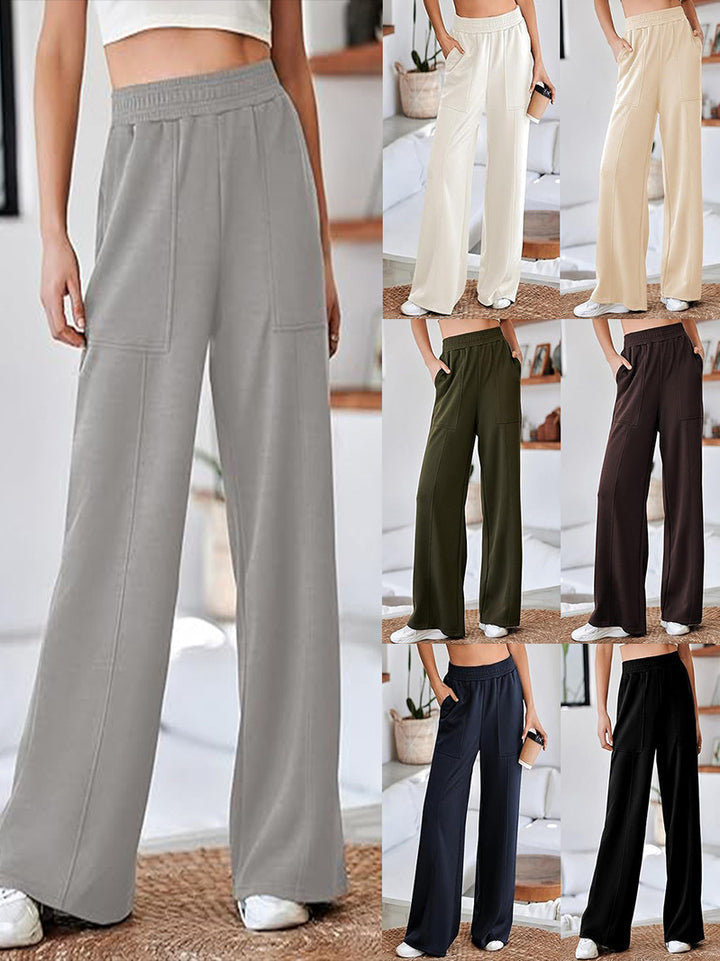 Loose sports pants for women with elastic waistband and practical side pockets Lune London