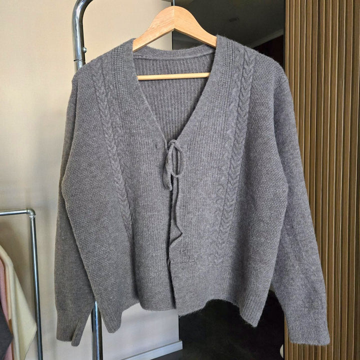 Women’s knit jacket with cable pattern and decorative drawstring Lune London