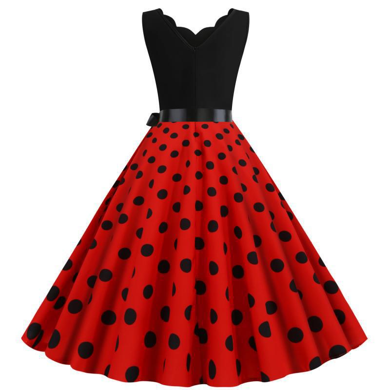 Robe swing femme avec un design moderne à pois et un élégant col en V Chic & Stil