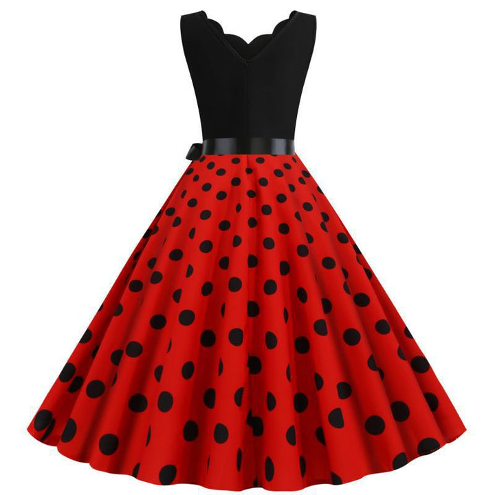 Robe swing femme avec un design moderne à pois et un élégant col en V Chic & Stil