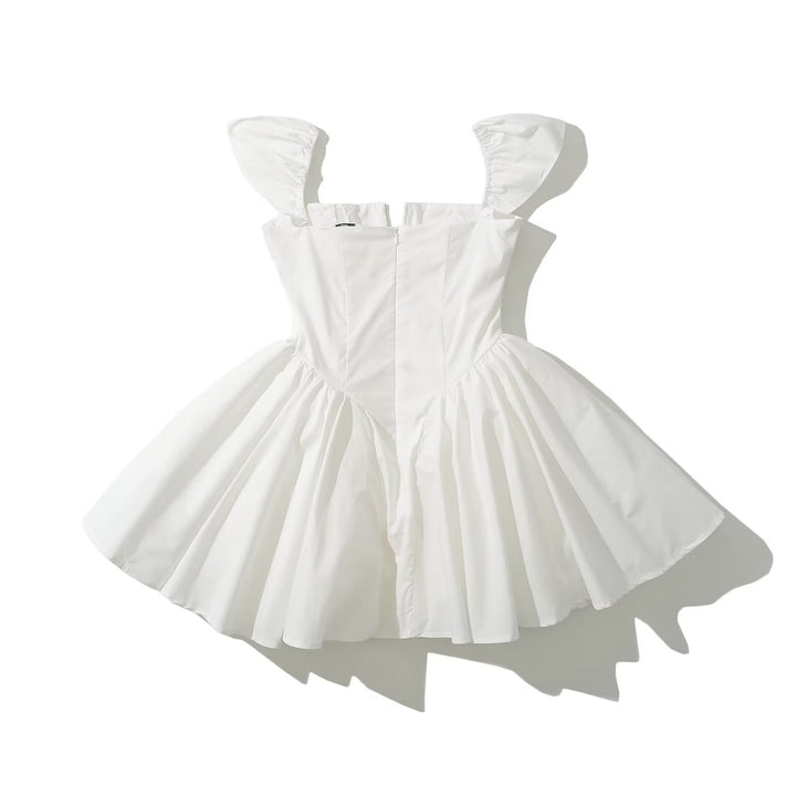 Mini dress for ladies with voluminous ruffle elements and a button detail Lune London