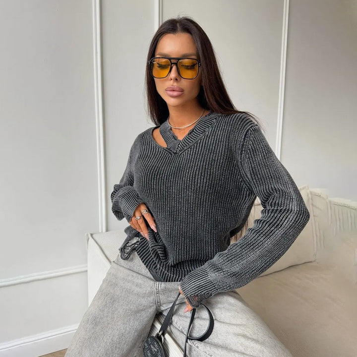 Thick knitted sweater for women with a trendy V-neck and worn elements Lune London