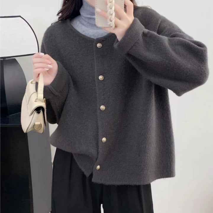 Women's chunky knit cardigan with elegant button placket and relaxed fit Lune London