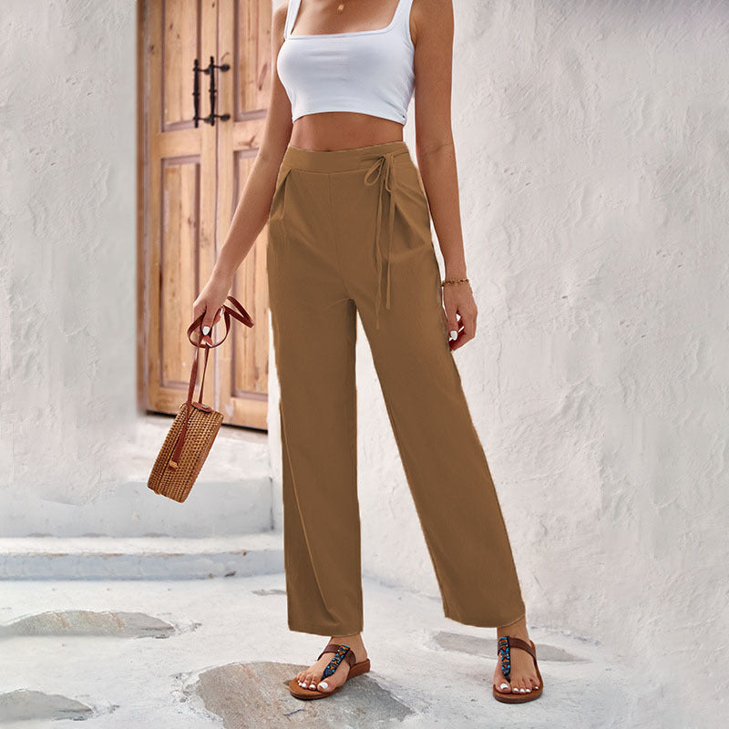 Loose summer pants for women with elastic waistband and tie belt Lune London