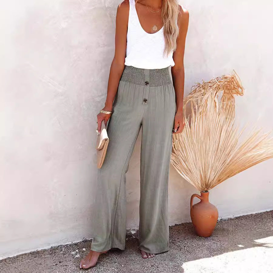 Loose summer trousers for women with elastic waist and button details Lune London