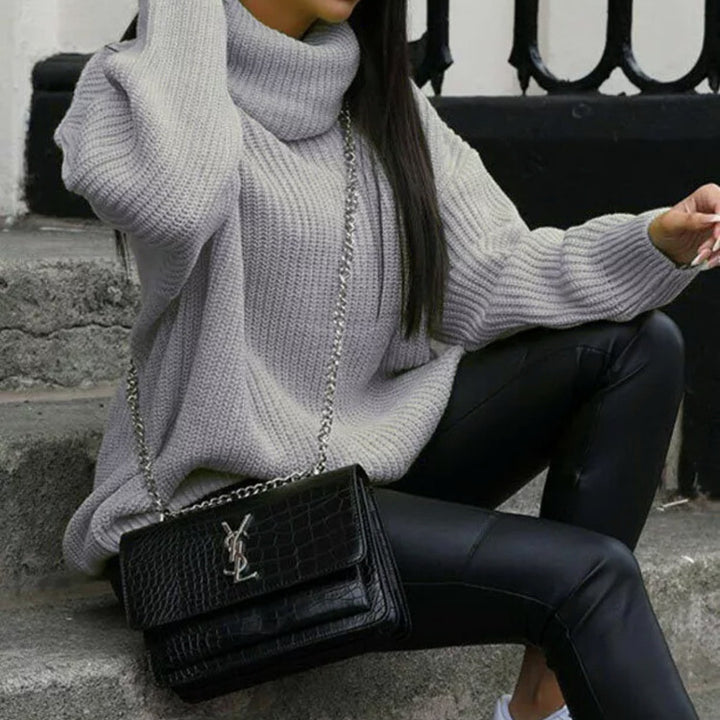Pull en maille pour femmes avec col montant et coupe haute Chic & Stil