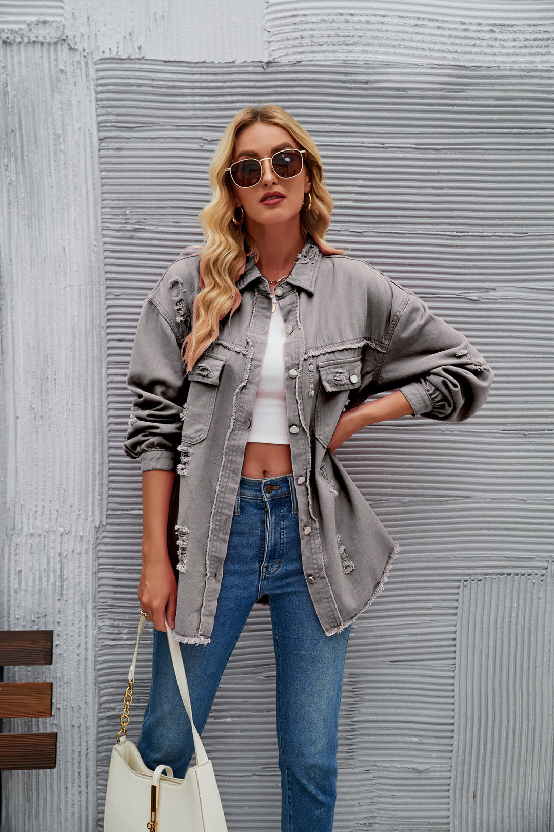 Oversized denim jacket for women with modern distressed details Lune London