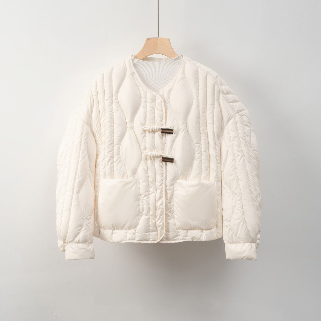 Quilted ladies' jacket with practical button closure and comfortable pockets Lune London