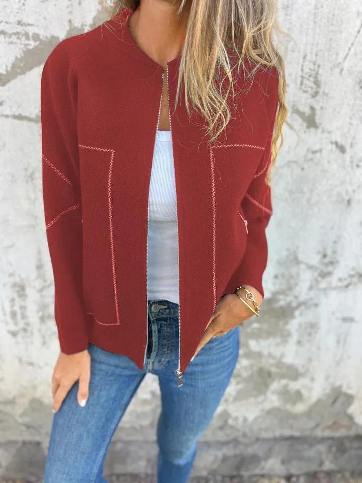 Ladies' knit jacket with stylish zipper details and a fine textured pattern Lune London
