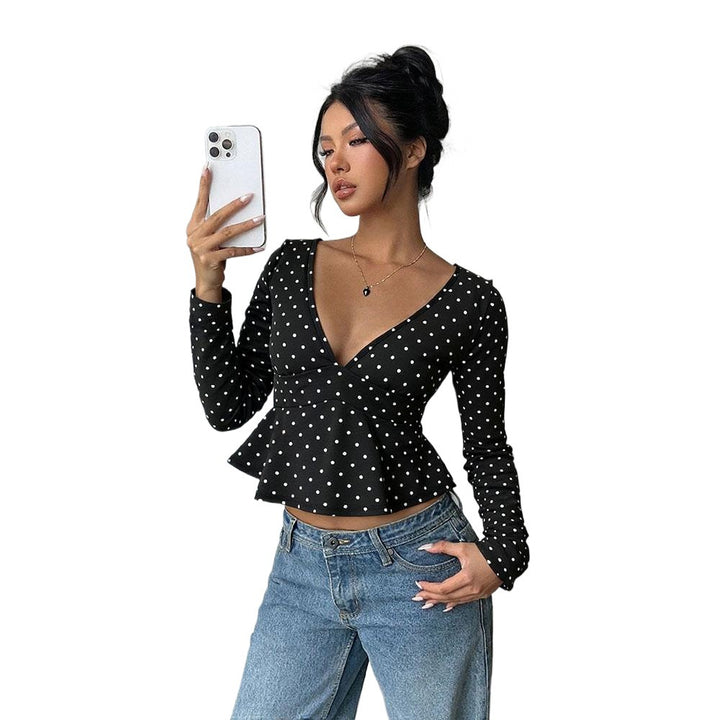 Chemisier pour femmes avec coupe peplum et motif à pois Chic & Stil