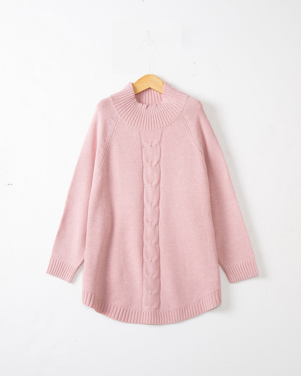 Chunky knit sweater for women with a high collar and cable patterns Lune London