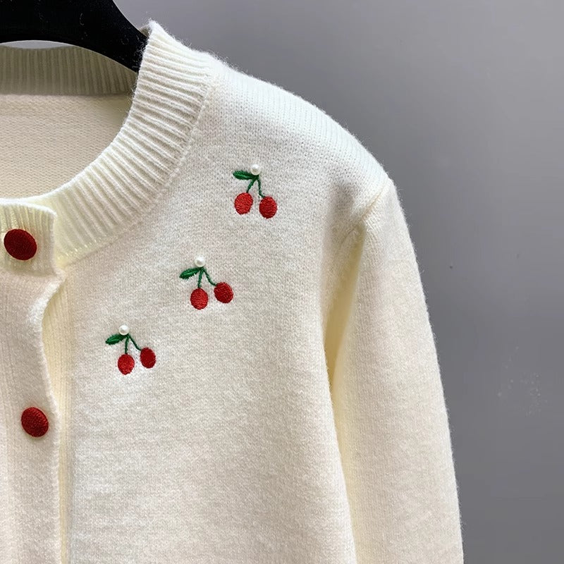 Ladies playful cardigan with embroidered cherries and red buttons Lune London