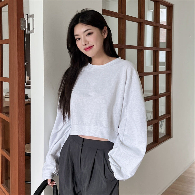Pull court pour femmes avec manches ballon Chic & Stil