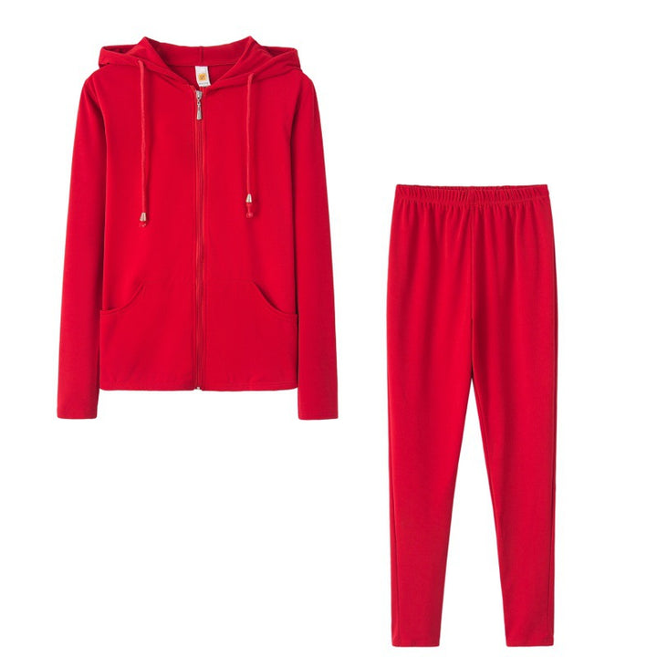 Ensemble de sport pour femmes en deux pièces avec veste à capuche et pantalons ajustés Chic & Stil