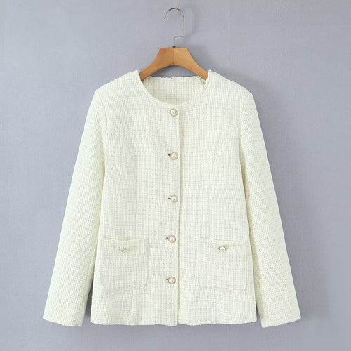 Ladies elegant knitted vest with textured design and pearl buttons Lune London