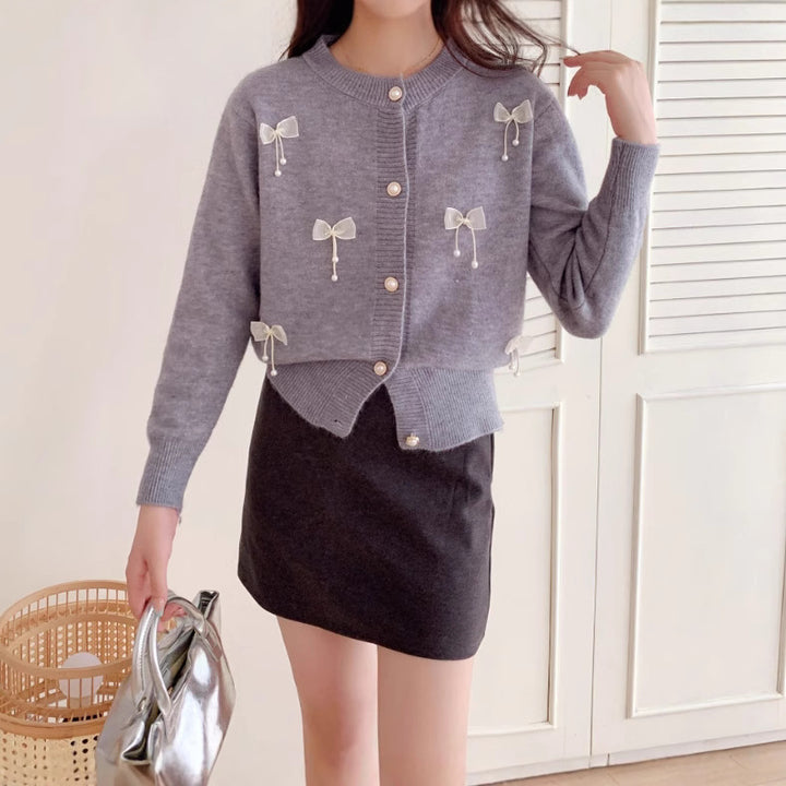 Knitted jacket for women with lace embellishments and button details Lune London