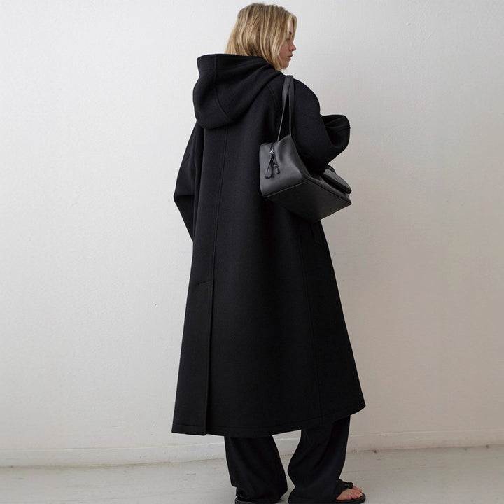 Manteau surdimensionné élégant pour femmes avec capuche et poches pratiques Chic & Stil