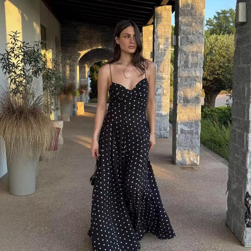 Midi dress for women with thin spaghetti straps and a playful polka dot design Lune London
