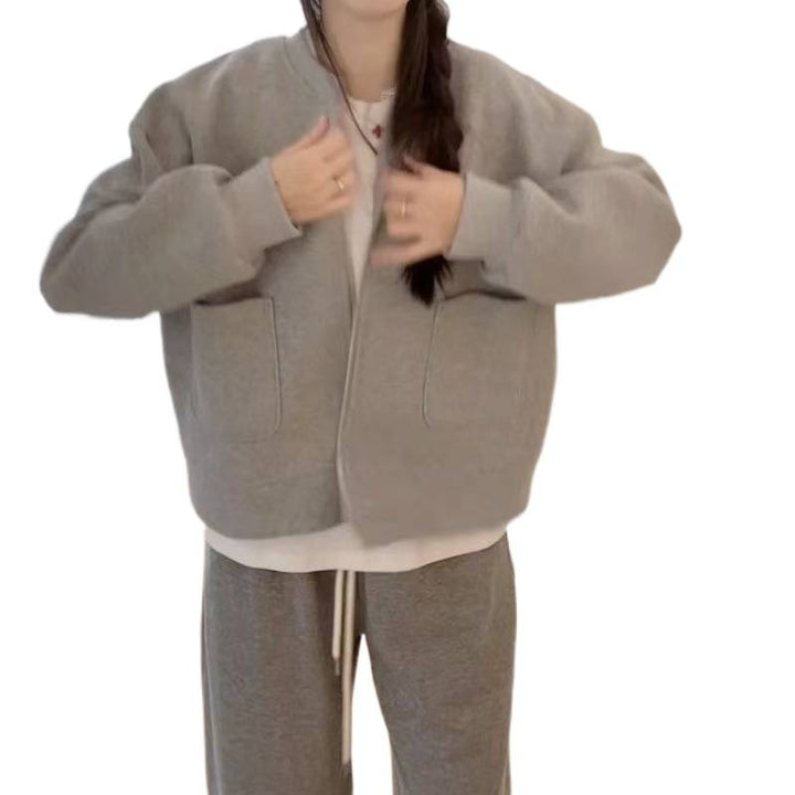 Women's oversized sweat jacket with practical pockets and fashionable design Chic & Stil