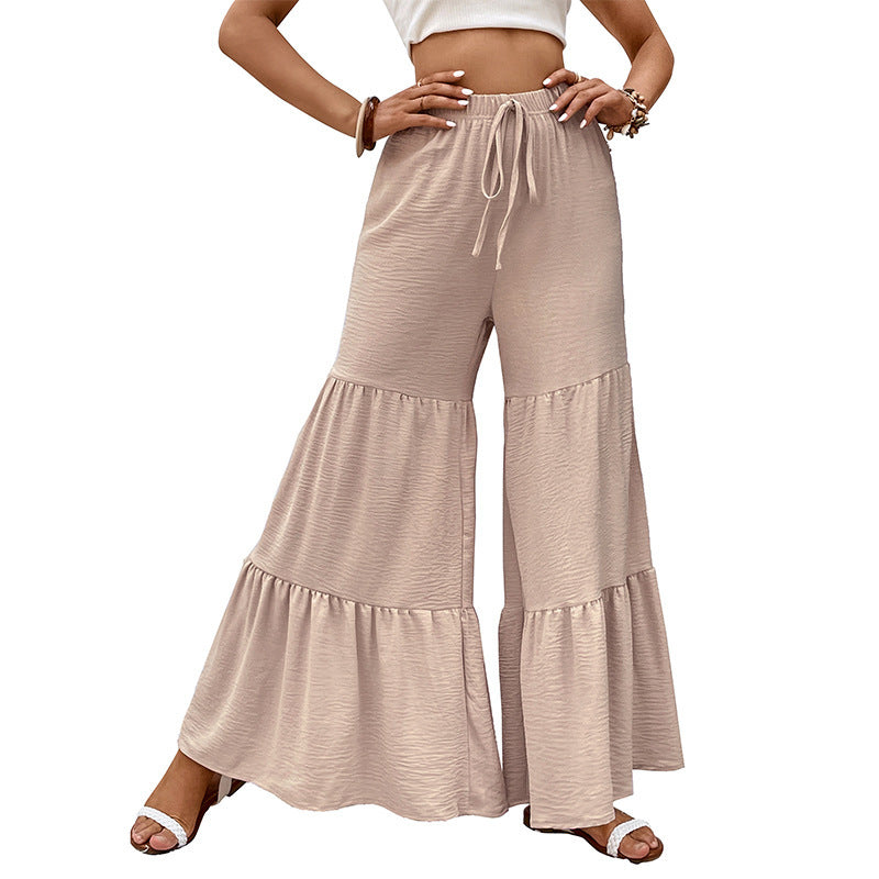 High-waisted flared palazzo pants for women with ruffled hem Lune London