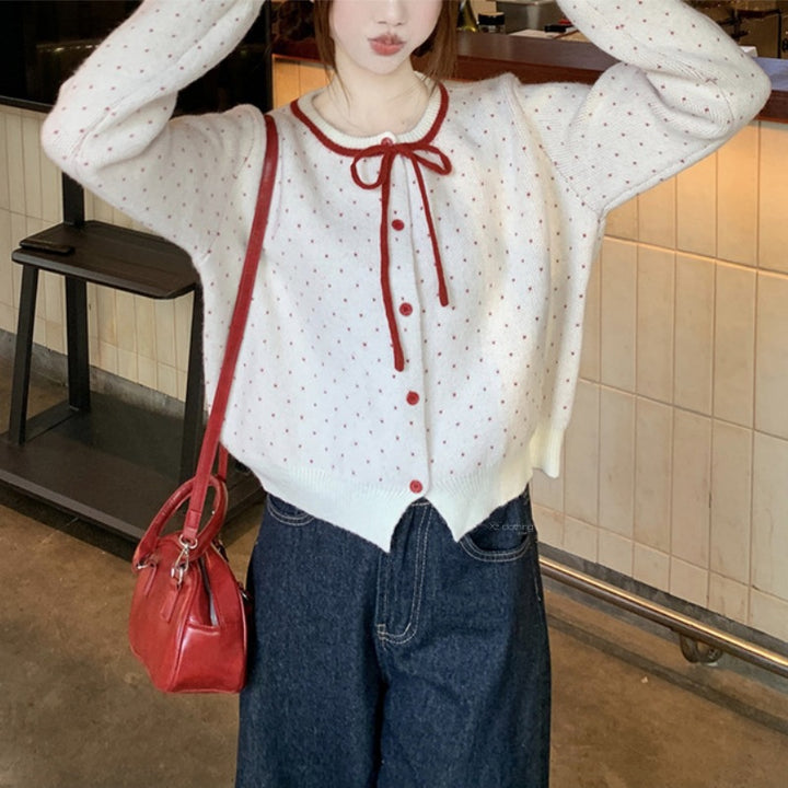 Cardigan féminin avec des pois et un nœud Chic & Stil