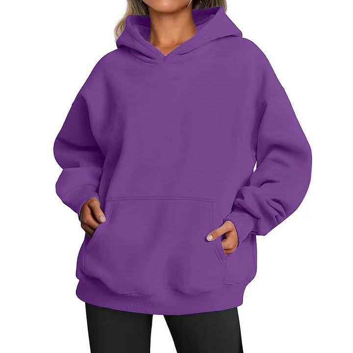 Women's oversized hoodie with practical kangaroo pockets and soft inner lining Chic & Stil