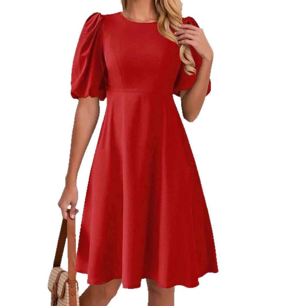 Puff sleeve dress for women with a flowing cut and waist accentuation Lune London