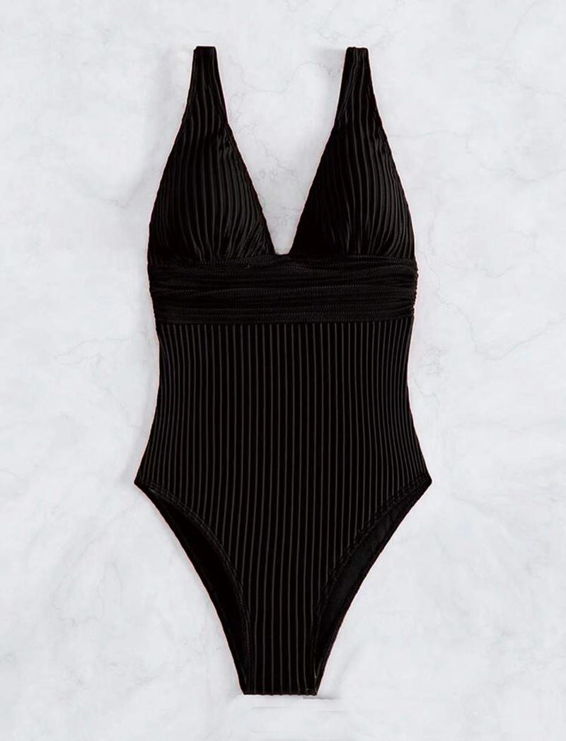 One-piece swimsuit for women with a refined ribbed design and a deep V neckline Lune London