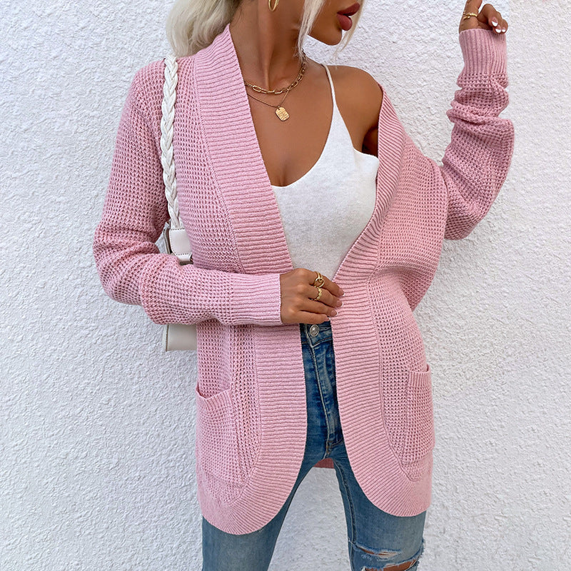 Knitted jacket for women with a relaxed fit and open pockets Lune London