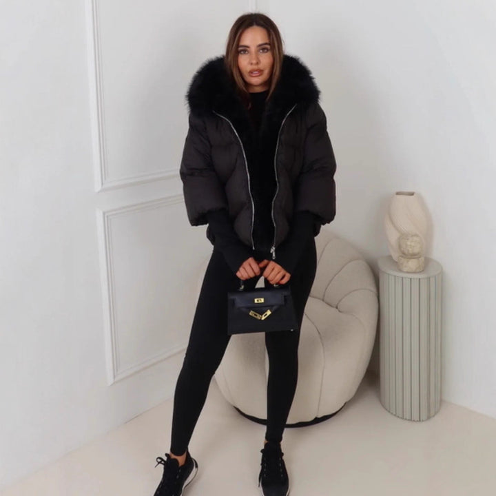 Veste d'hiver pour femmes avec un luxueux col en fausse fourrure et un design matelassé Chic & Stil